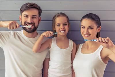 family brushing their teeth in hampton park