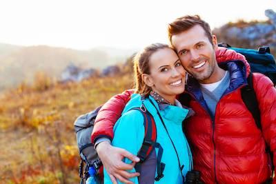 smiling couple with veneers