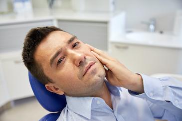 dental patient suffering from a toothache in hampton park