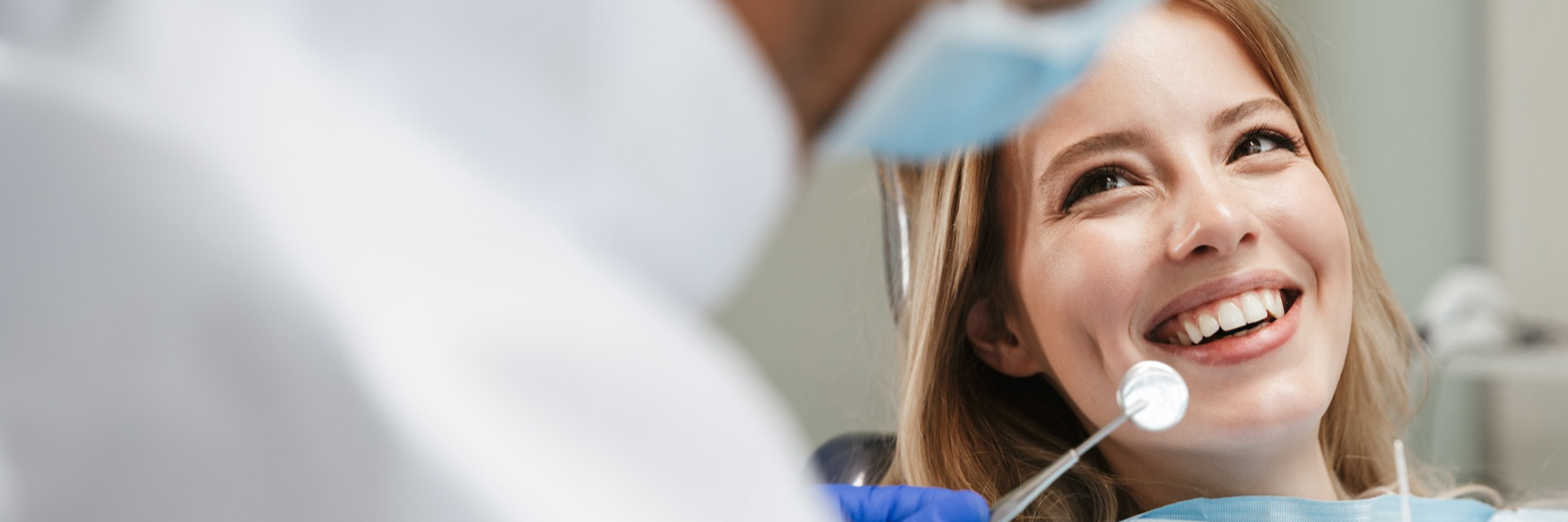 woman at dentist in hampton park for wisdom tooth removal consultation